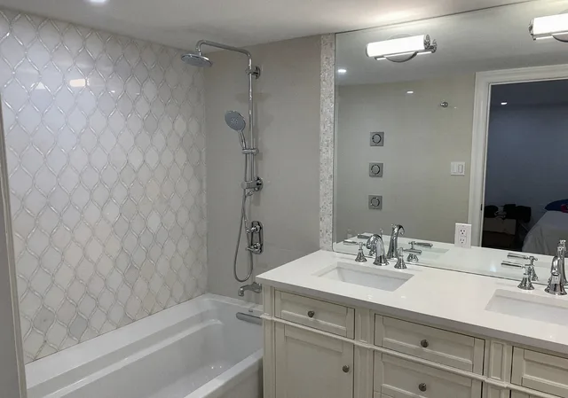 Bathroom Remodel 2: Basement bathroom after the remodel, with a double vanity and rain shower